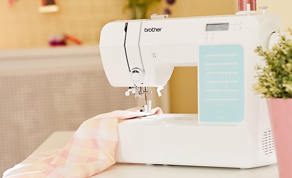 A sewing machine with fabric.