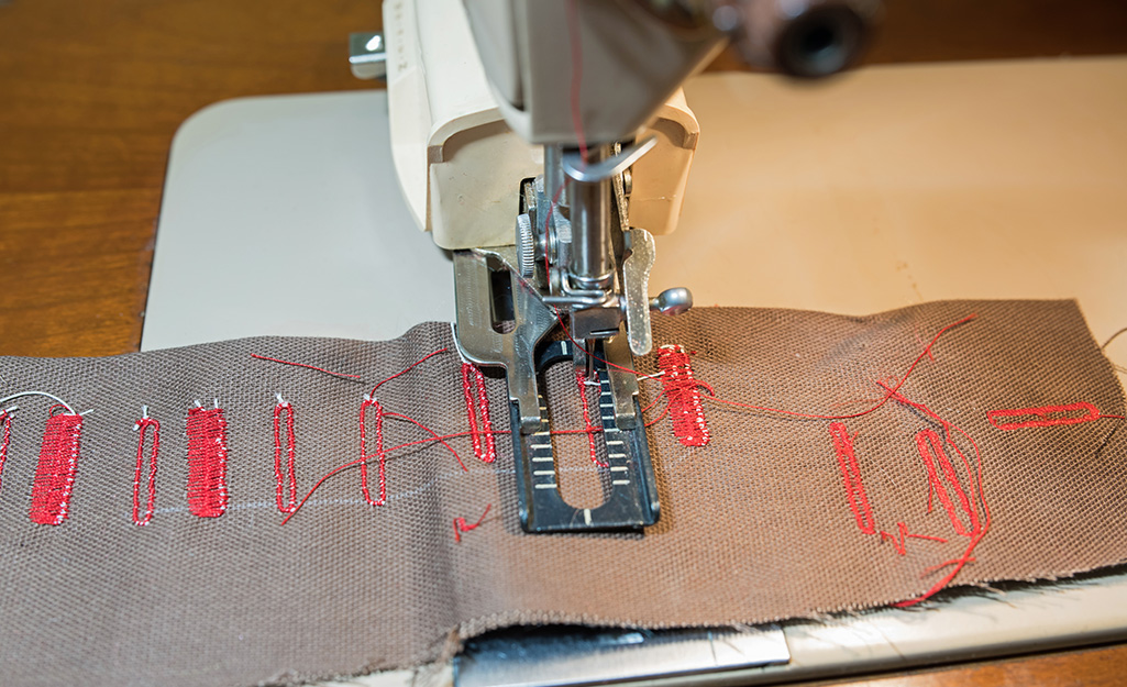 A sewing machine creating buttonholes