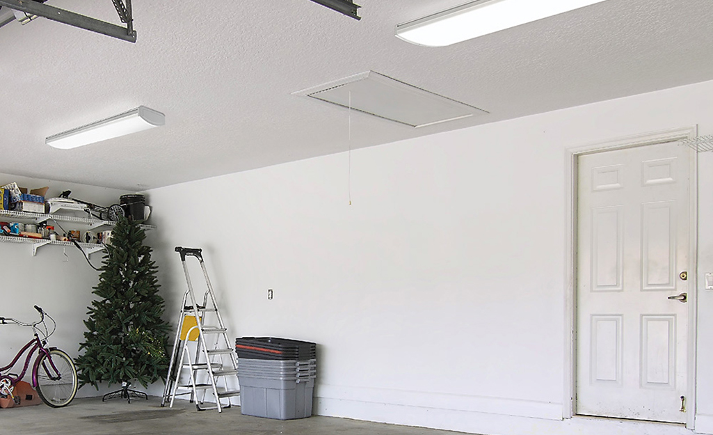 A garage with wraparound garage lights.