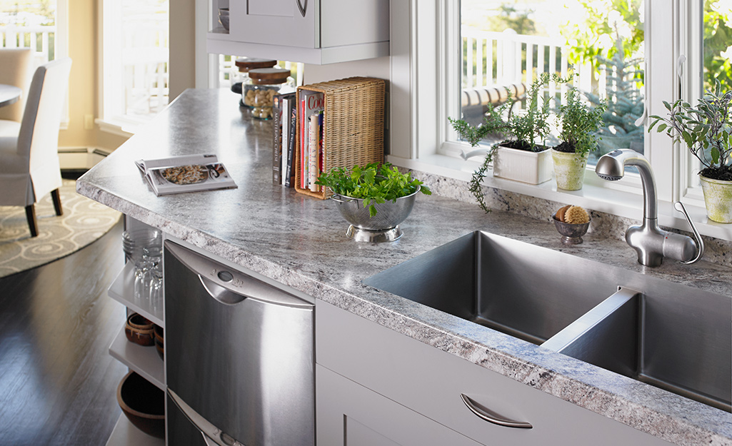 A kitchen featuring clean granite countertops.