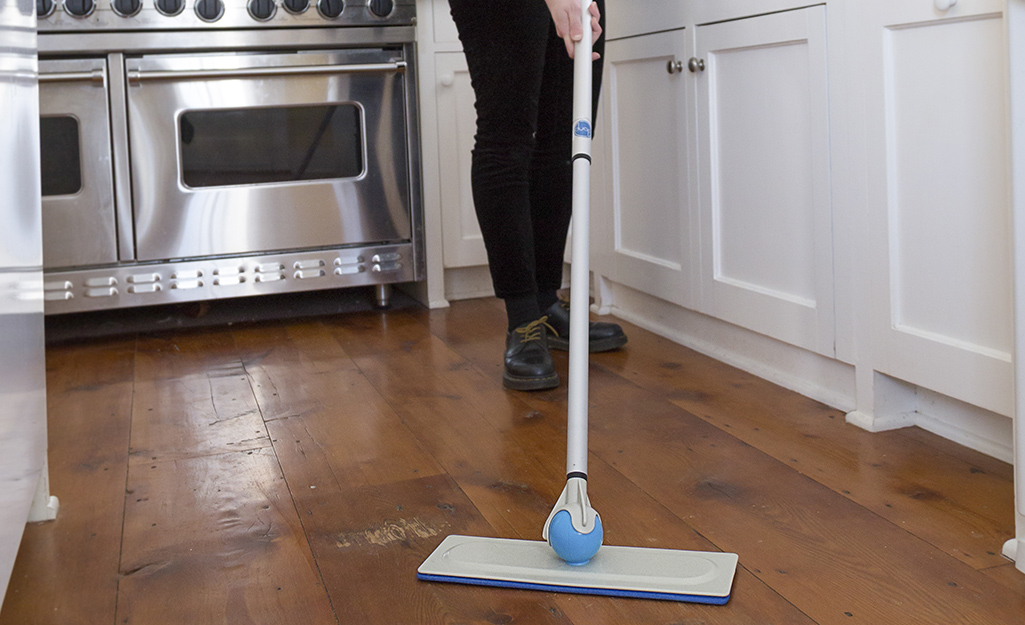 Mopping over wood floors.