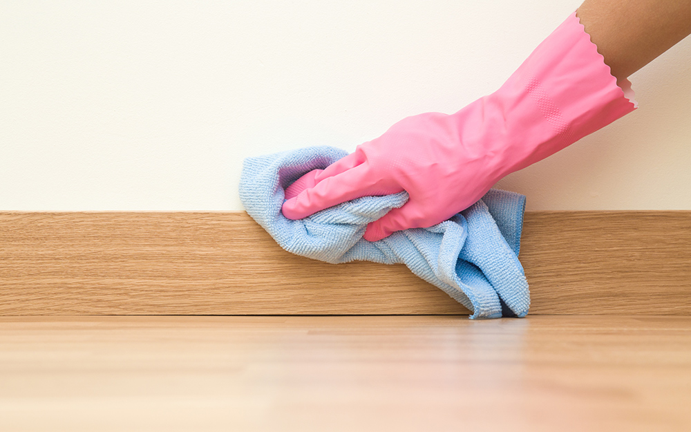 People Cleaning Walls