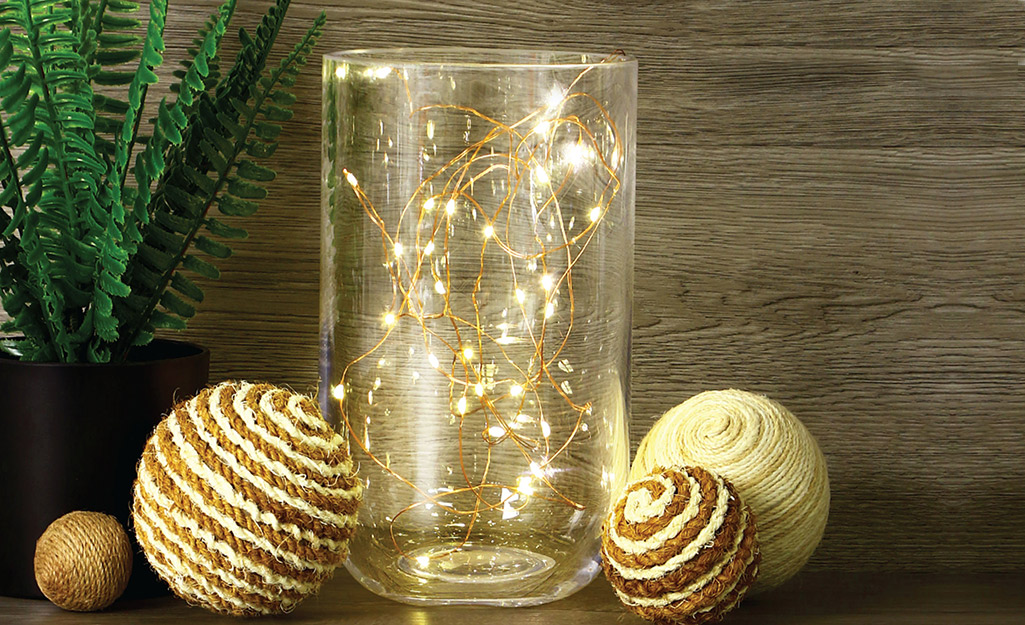 Battery-operated Christmas lights used in tabletop decor.