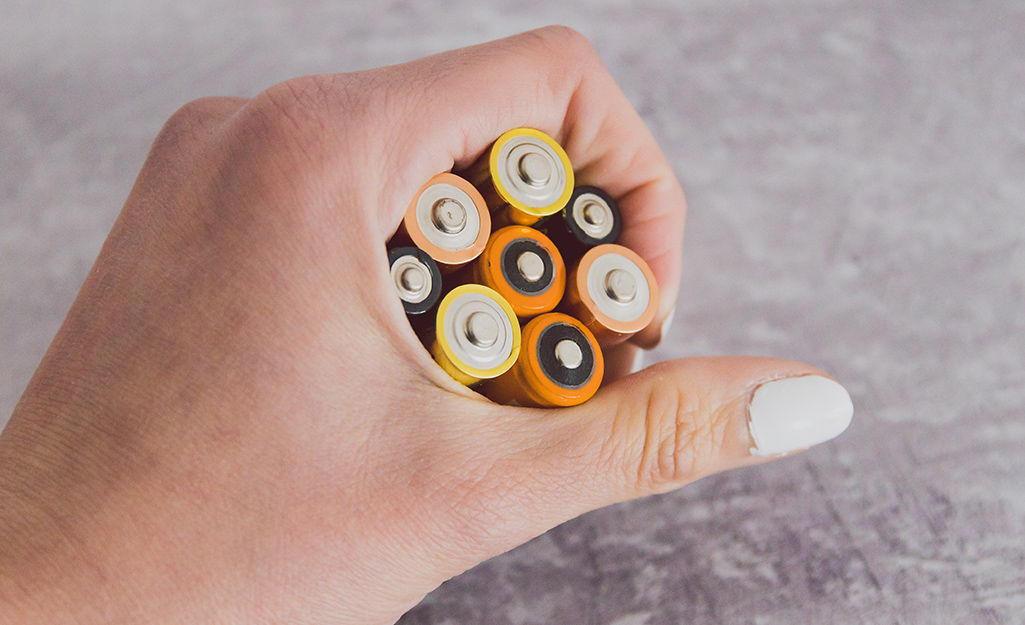 A picture of a handful of batteries.