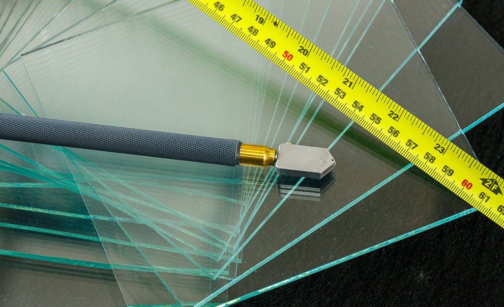 Measuring tools on glass panes.