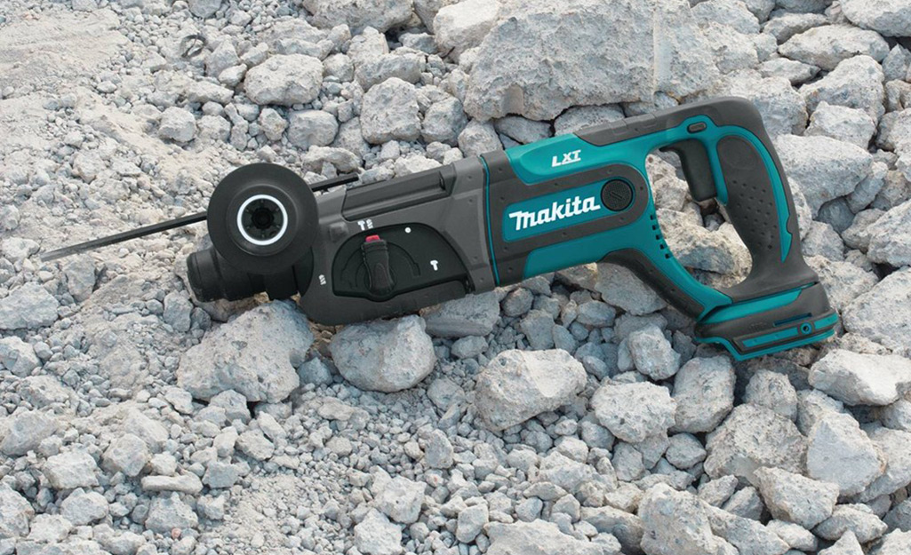 How to drill into concrete with a hammer drill hot sale