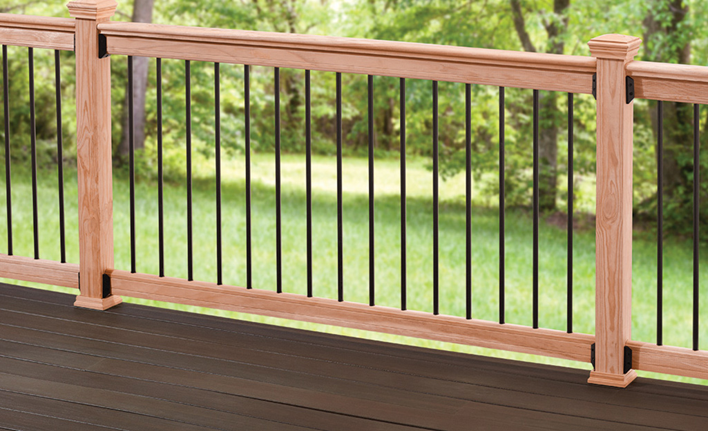 A completed wooden deck railing.