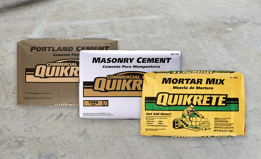 A bag of mortar mix beside a bag of masonry cement and a bag of Portland cement.