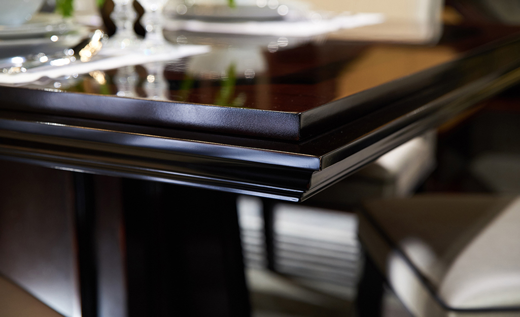 A table finished in black lacquer.