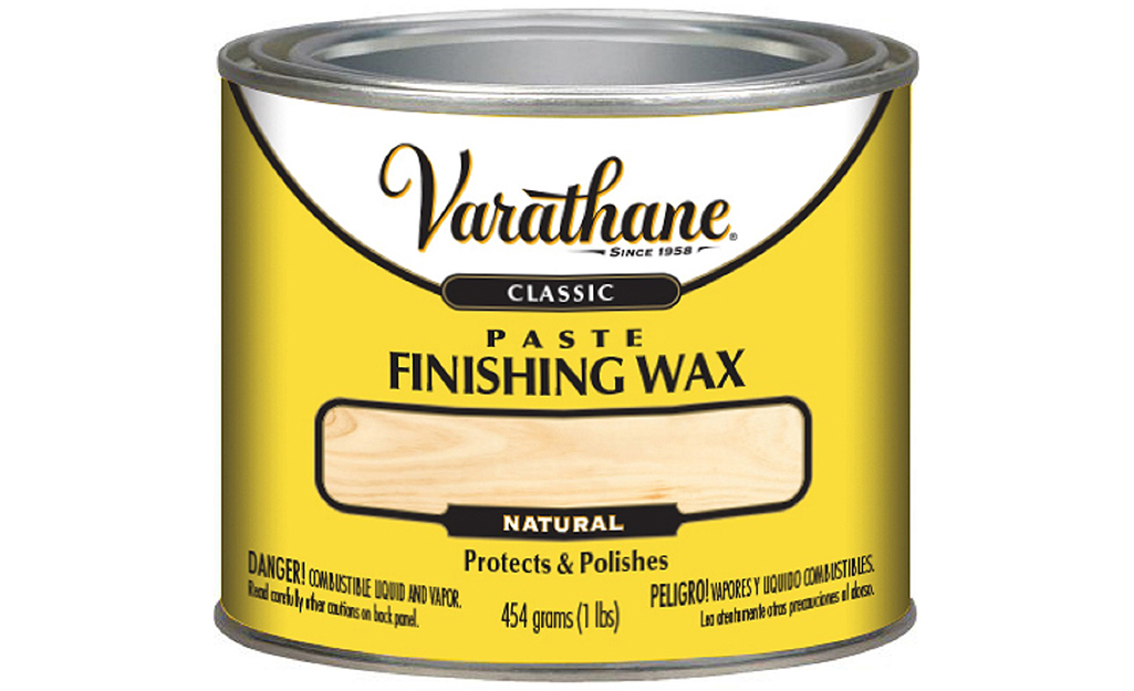A can of finishing wax on a white background.