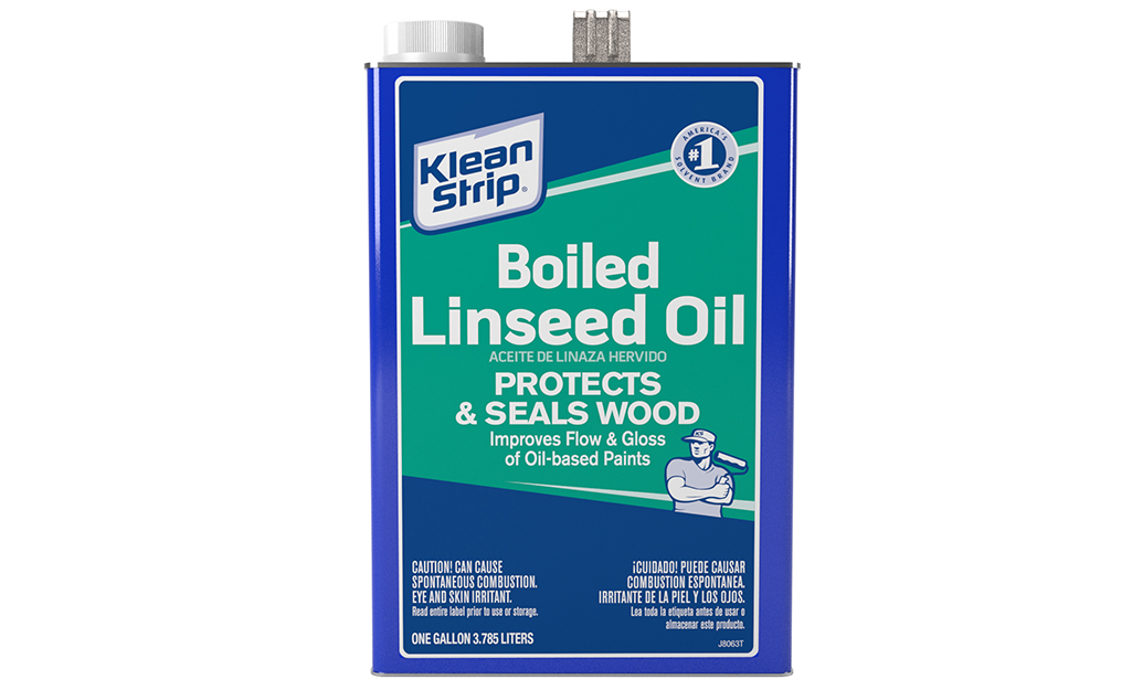 A can of linseed oil on a white background.