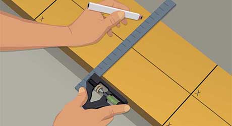 Person using a pencil and a ruler to mark top and sole plates Person using a pencil and a ruler to mark top and sole plates