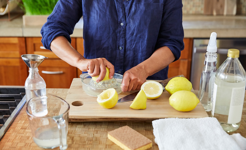 A person using homemade ingredients like lemons.