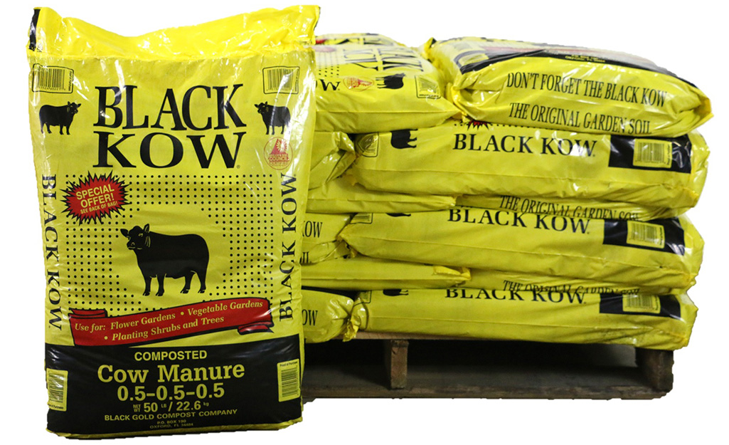 Yellow bags of Black Kow cow manure.