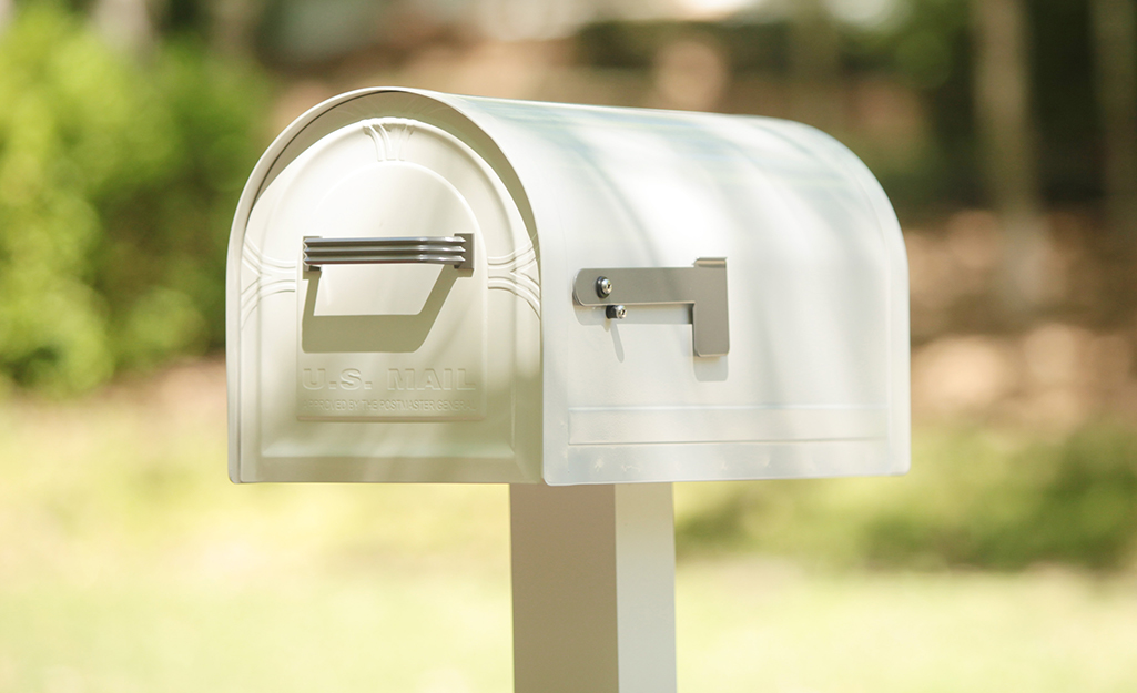 A mailbox on a post.