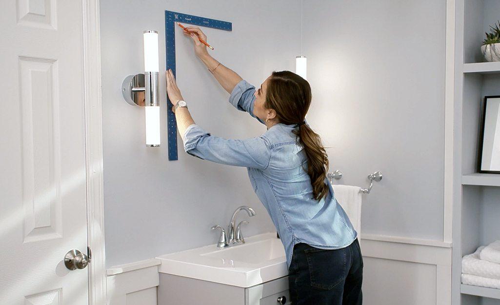 how to hang a bathroom cabinet on the wall