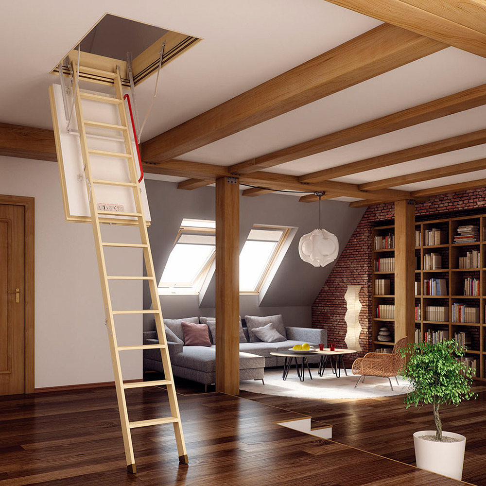 A room with an attic ladder coming down from the ceiling