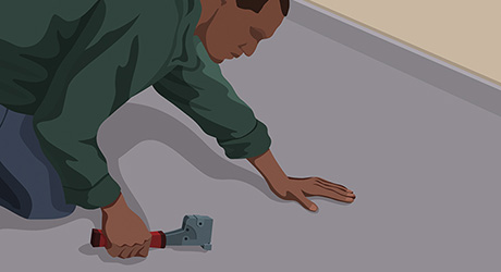 Step 2: Person Laying Down Carpet Pad Step 2: Person Laying Down Carpet Pad