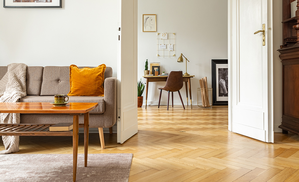 A parquet tile floor placed throughout a home.