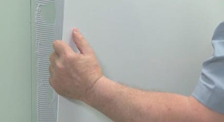 Apply adhesive to the panel Apply adhesive to the panel