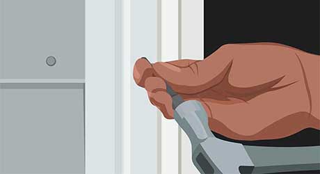 Illustration of person's hand holding a hammer and nail. Illustration of person's hand holding a hammer and nail.
