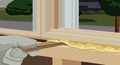 Illustration of gloved hand filling gaps in window frame with fiberglass insulation. Illustration of gloved hand filling gaps in window frame with fiberglass insulation.