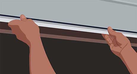 Illustration of person cutting the length of a drip edge to fit over top of window. Illustration of person cutting the length of a drip edge to fit over top of window.