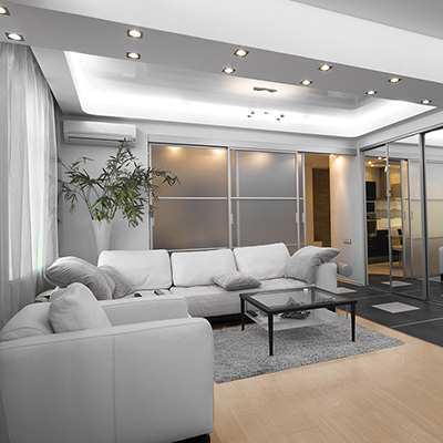 Recessed lighting in a modern decor living room.