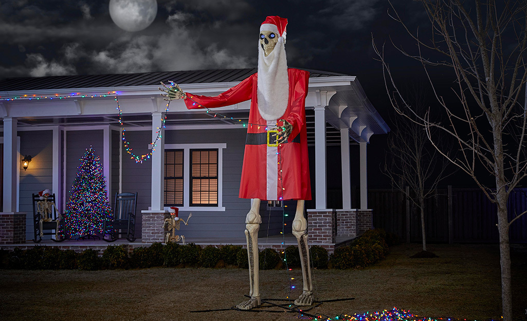 A 12-foot skeleton dressed up in a Santa costume.