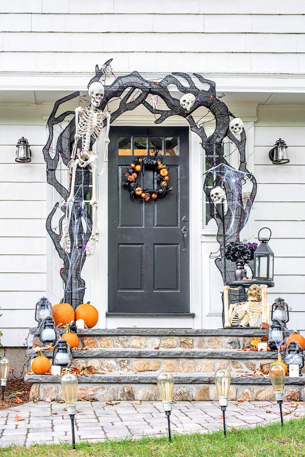 Halloween decorations and pumpkins around the front door