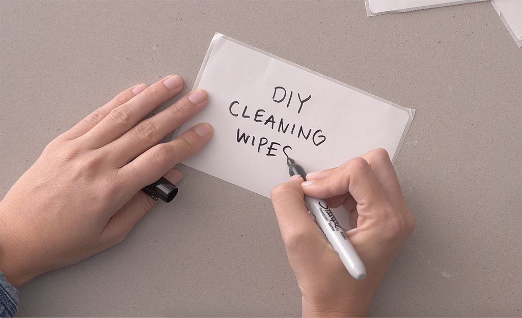 A label is being made for DIY cleaning wipes. 