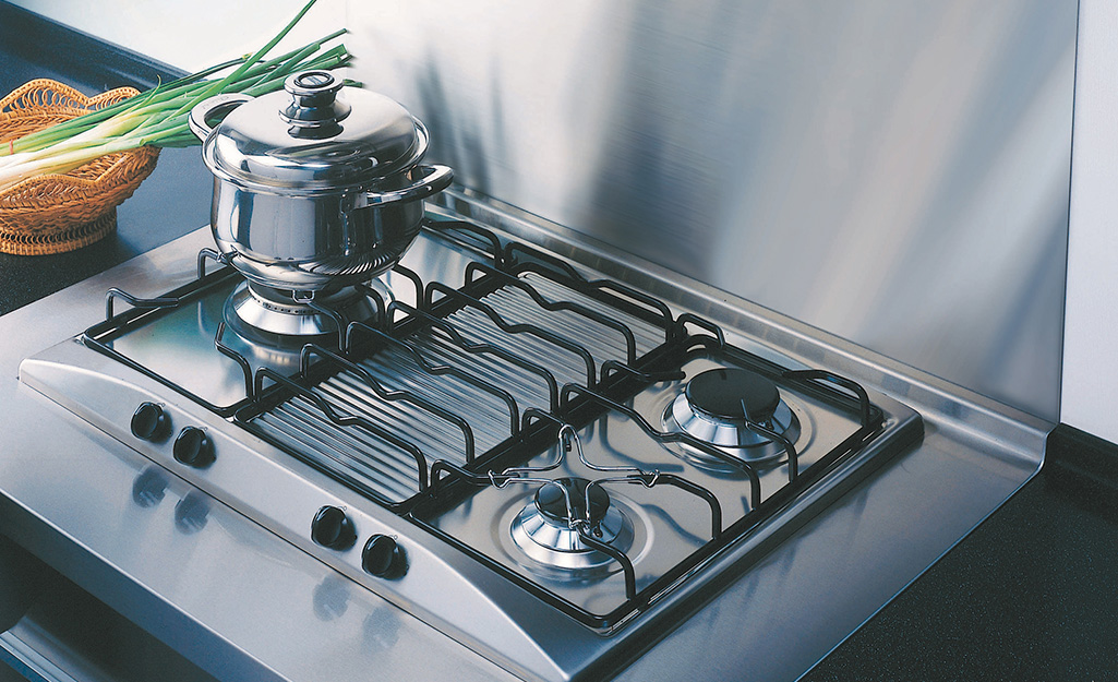 A gas cooktop installed in a kitchen.