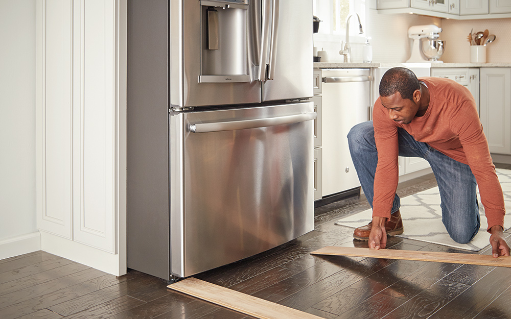 How to Move a Refrigerator to Clean behind  