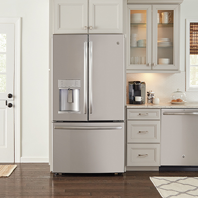 A stainless steel French door refrigerator in a kitchen