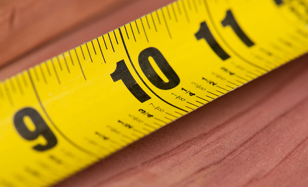 A tape measure showing inches and fractions of inches.