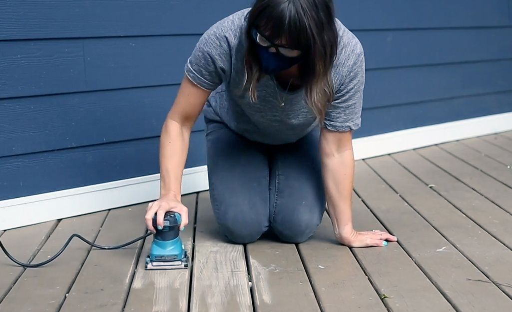 Belt sanding outlet a deck