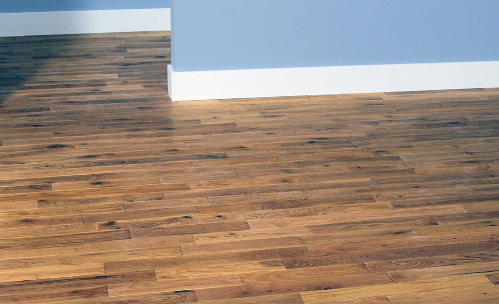 A hardwood floor featuring a fresh finish. 
