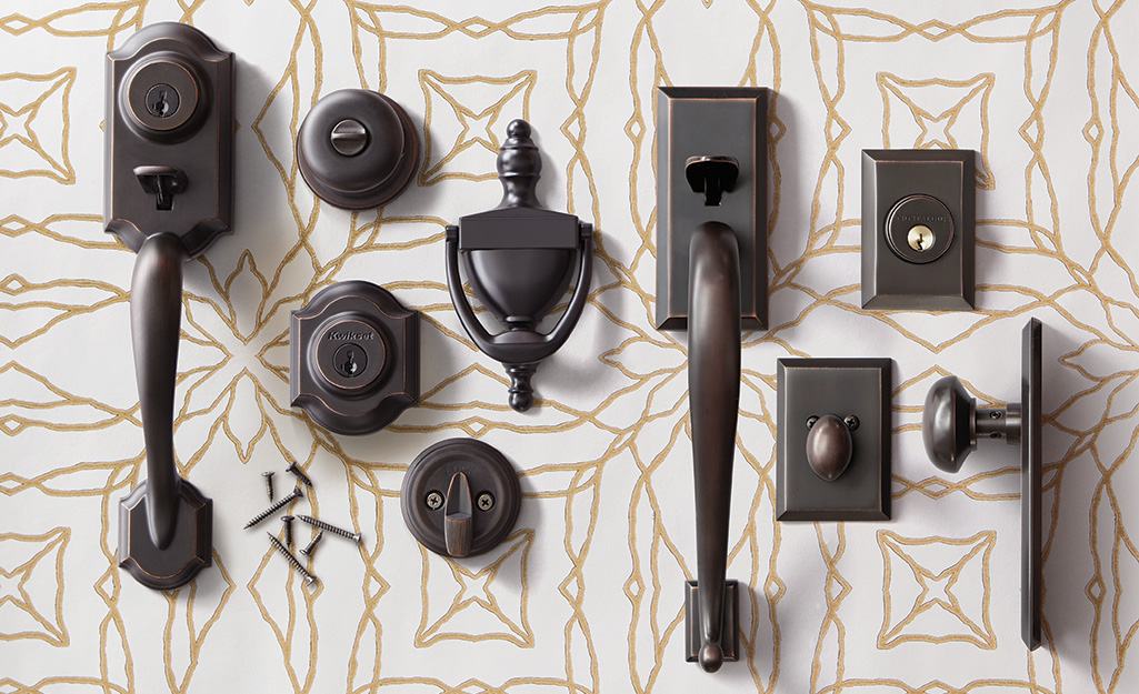 A variety of door knobs on pattern table.