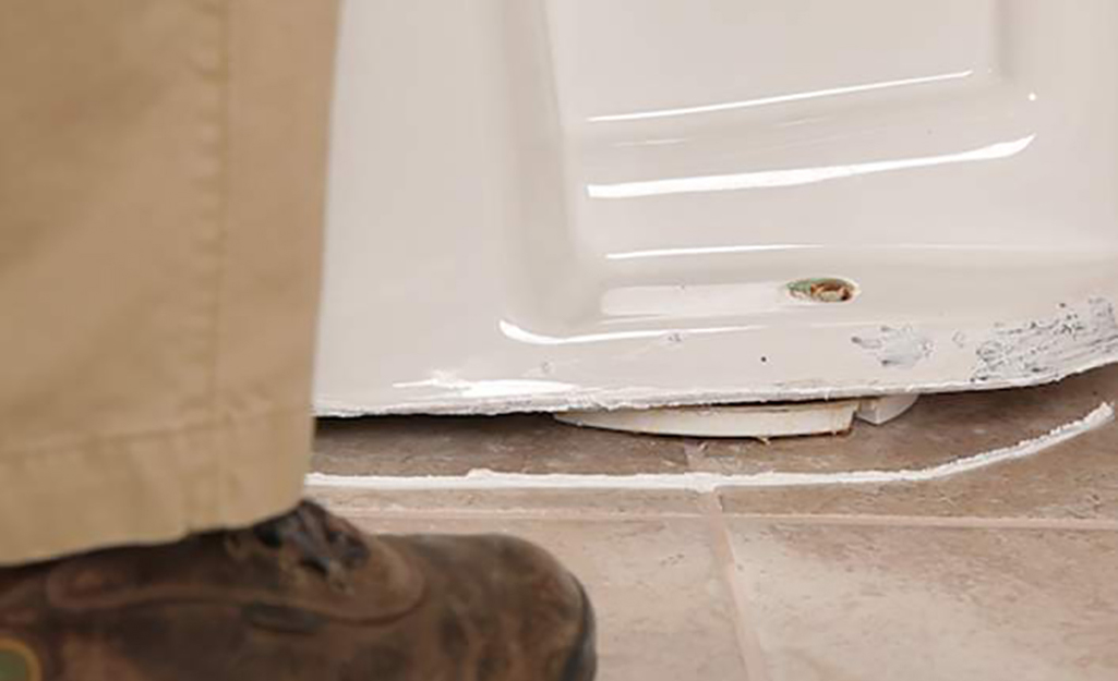 Close up of a broken toilet seal.