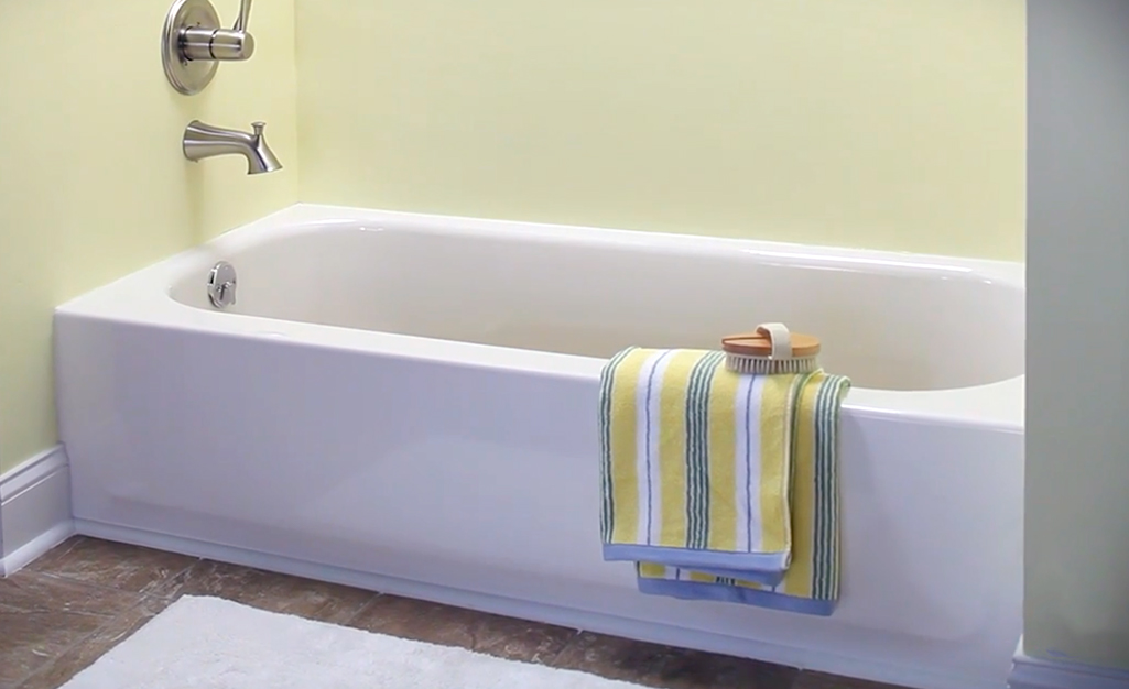 A newly installed tub in a bathroom.