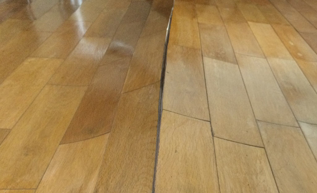 laminate flooring repair buckling fix depot