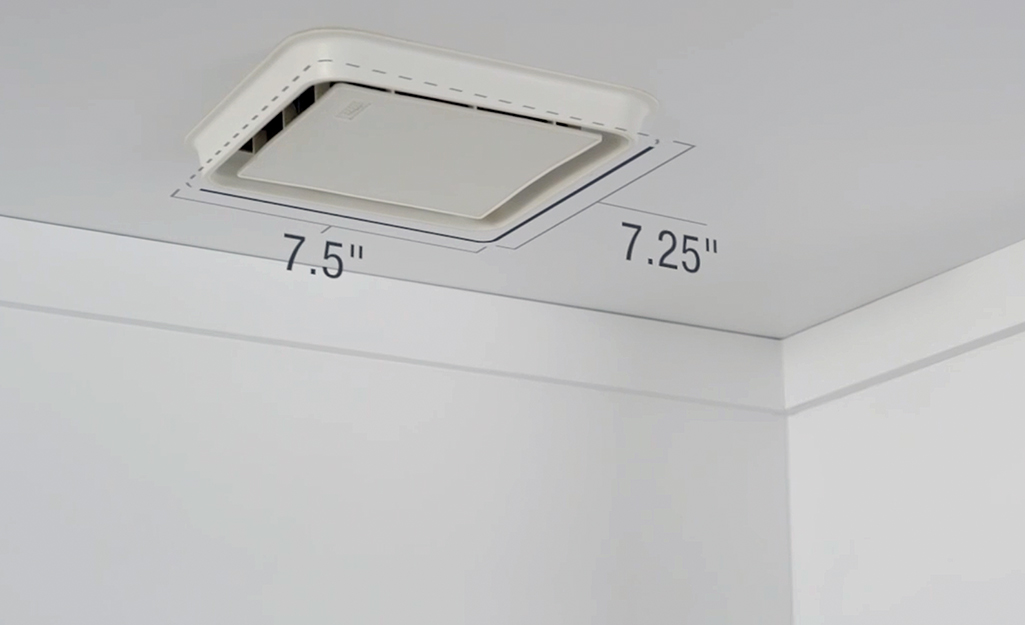 A bathroom exhaust fan is shown in the ceiling with measurements of its length and width.
