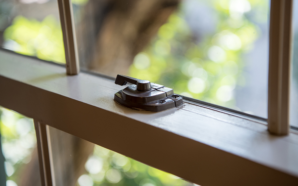 A window lock secures the sashes to prevent unwanted entry.