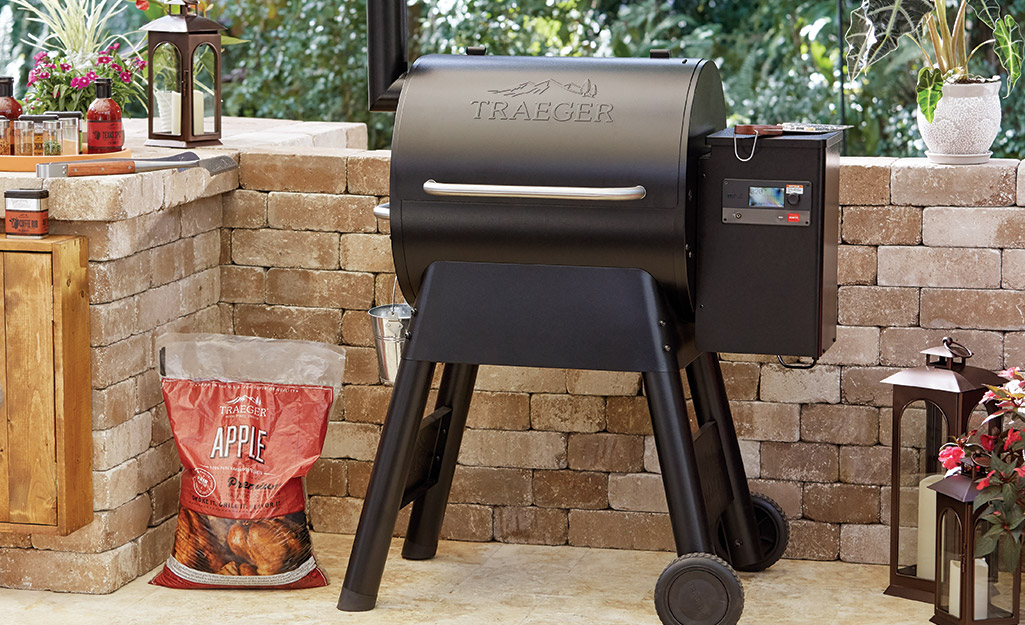 A smoker on a patio. A smoker on a patio.