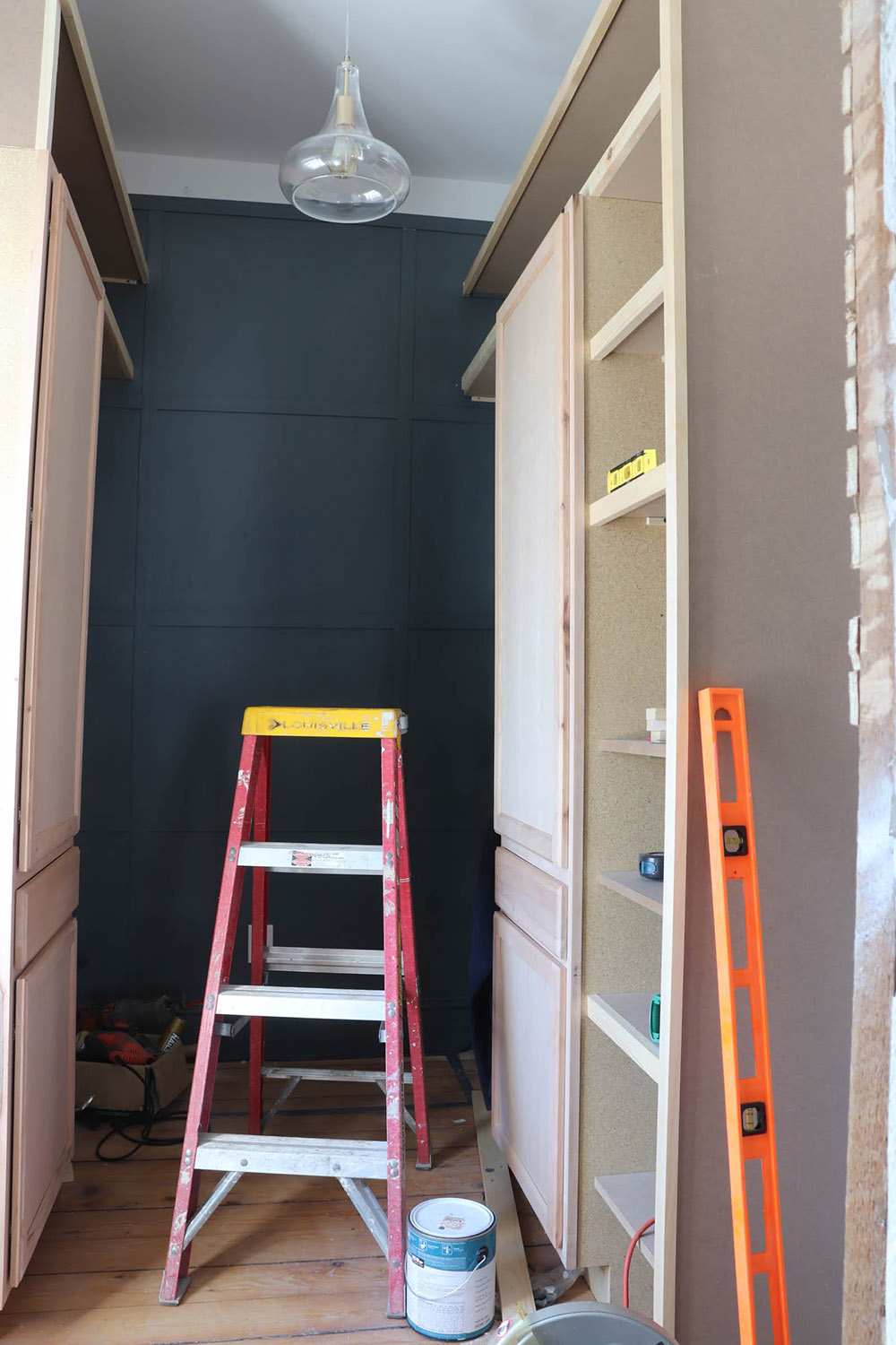 An in closet shot of a painted accent wall