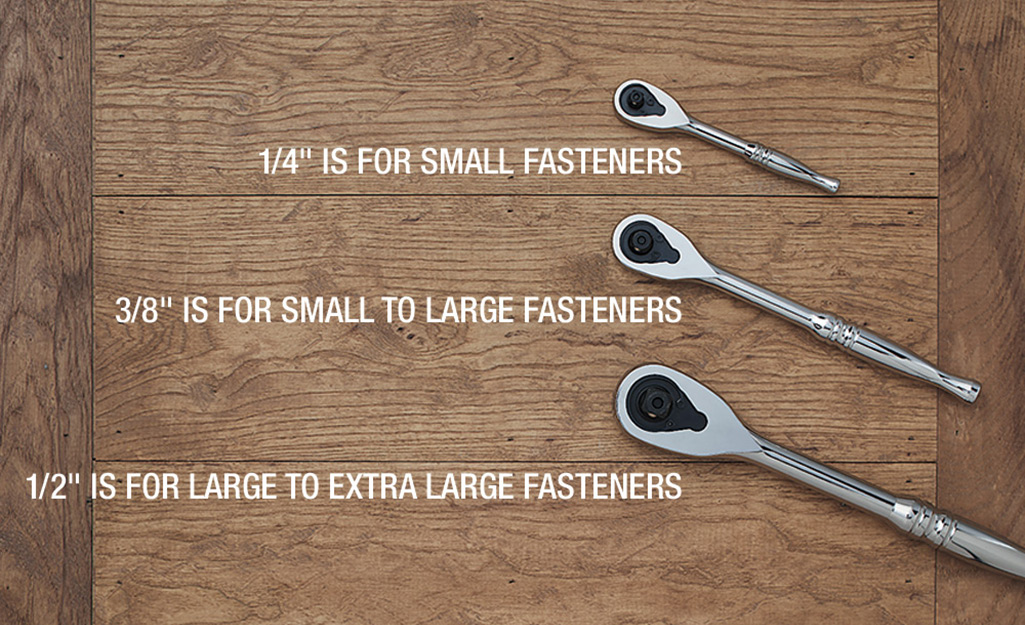 The different sizes of ratchets on a wooden surface.