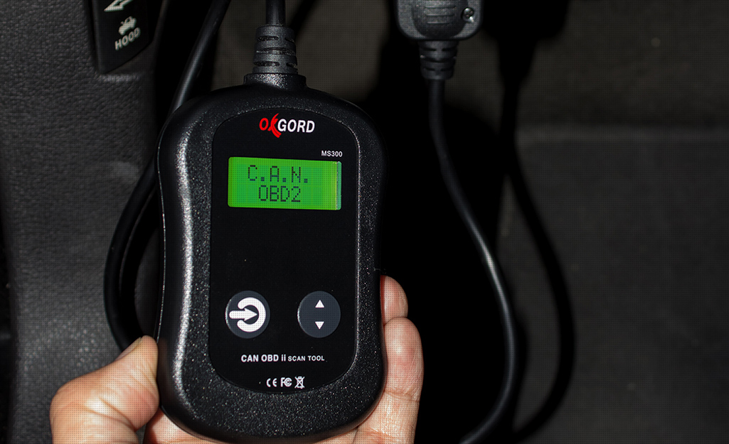a close up of an OBD2 scanner code