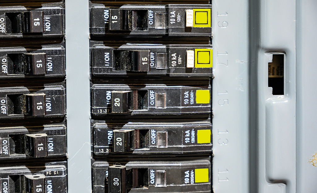 An open circuit breaker shows switches.