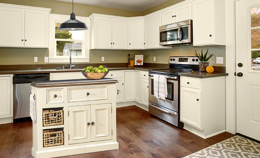 A small kitchen island in an open kitchen layout.