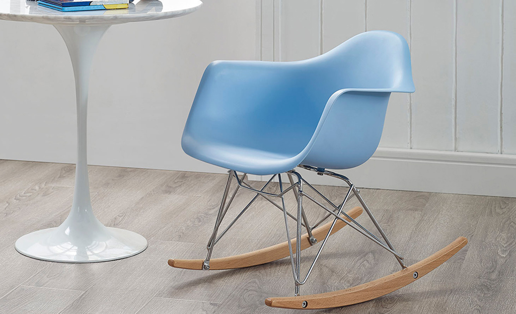 A blue rocking chair. A blue rocking chair.